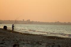 Angler on an empty beach / Sousse / Tunisia